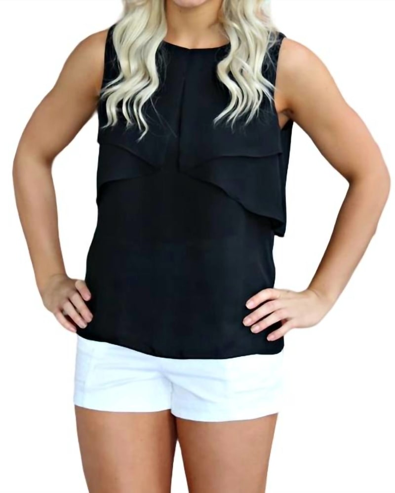Front of a model wearing a size L Sleeveless Blouse With Flat Ruffle in Black in Black by THML. | dia_product_style_image_id:340368